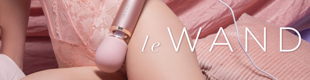Simply Pleasure Le Wand Brand Banner Image - Woman holding a massaging wand