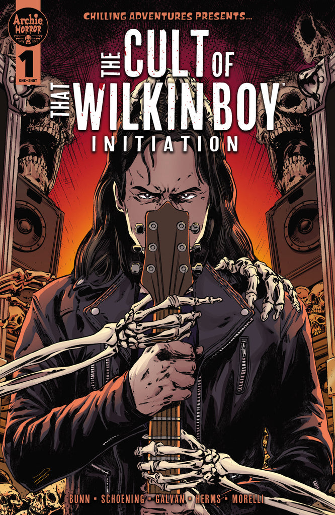 Main cover to The Cult of That Wilkin Boy: Initiation. Bingo Wilkin holds a guitar in front of his face, while skulls and skeleton hands surround him. Art by Dan Schoening and Luis Delgado.