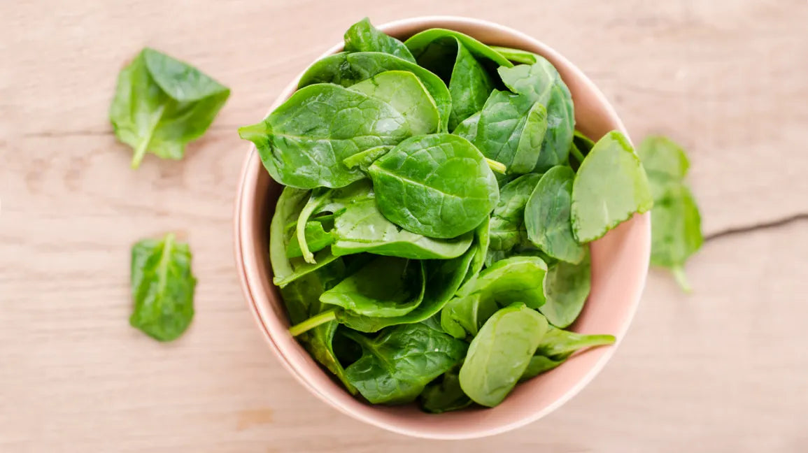 Bowl of spinach leaves