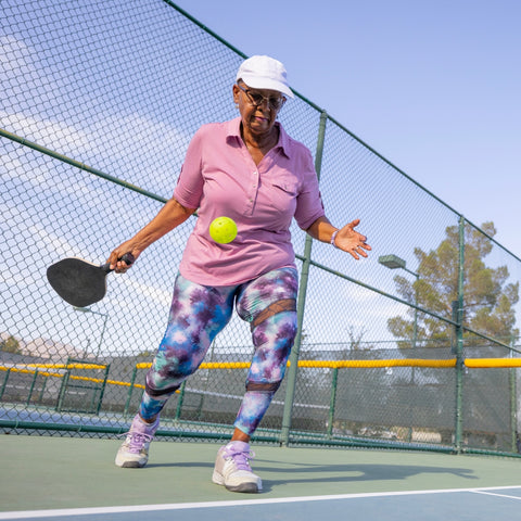 Woman playing pickleball