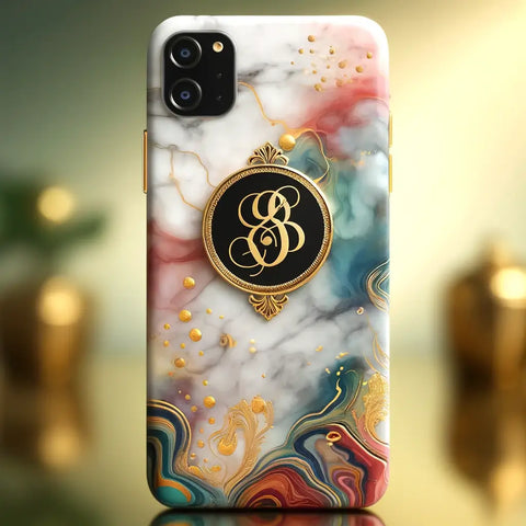 A sophisticated and vibrant bespoke phone case featuring a marble design, interspersed with colorful abstract shapes and a golden monogram