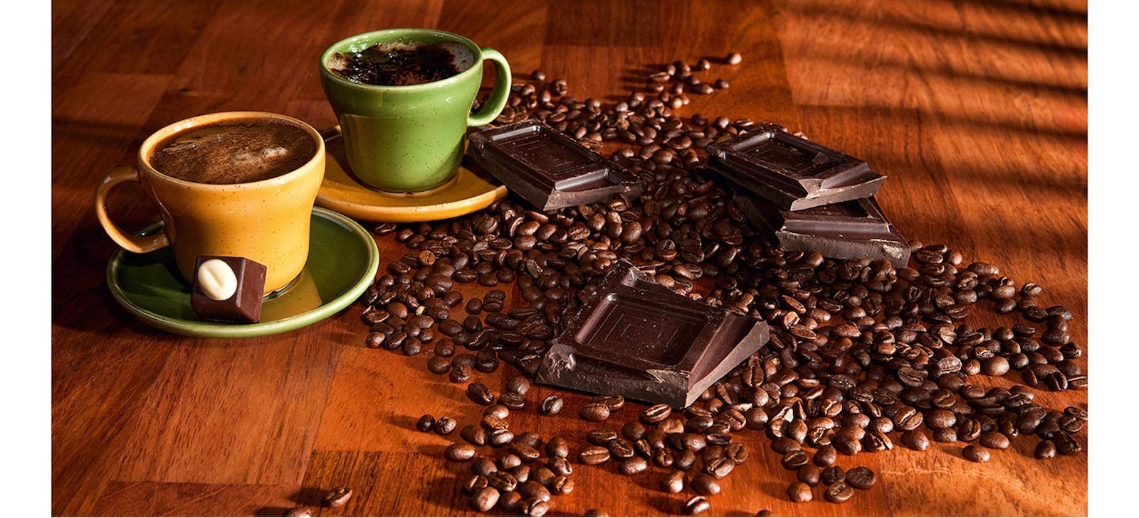 coffee cups and coffee beans on floor