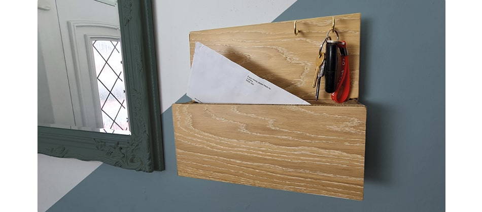wooden letter caddy on wall