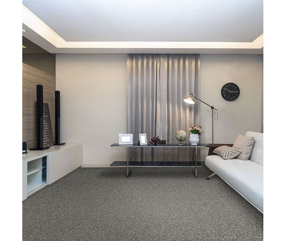 Cosy lounge room set with grey carpet