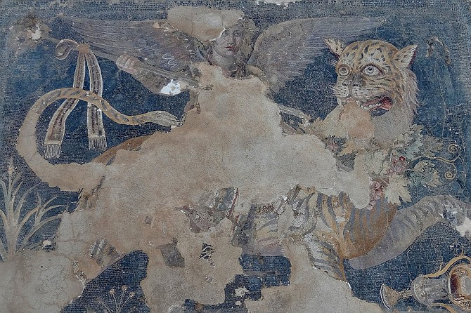 Dionysus as a winged deity riding a tiger 2nd Century BC.