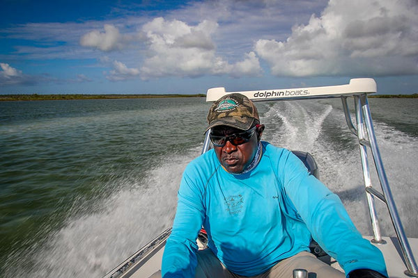 Simeon Higgs from East End Lodge races to the bonefish and permit flats.