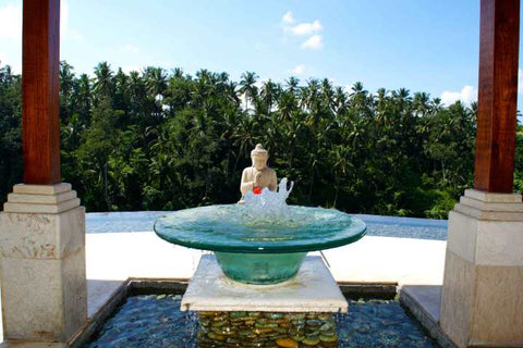 Buddha statue at the Viceroy in Ubud Bali by Kate Stoltz 