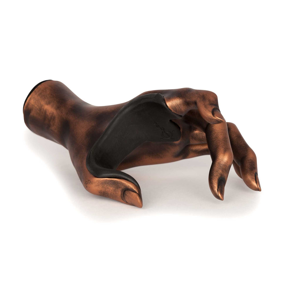 Antiqued copper female hand guitar wall hook. Top View. 