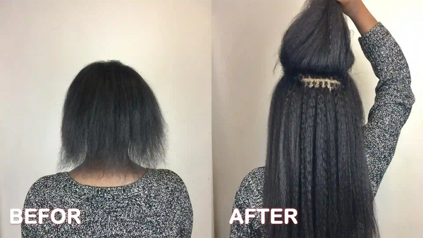 Eine schwarze Frau verwendet brasilianische Knoten, um ihr lockiges Haar zu verlängern
