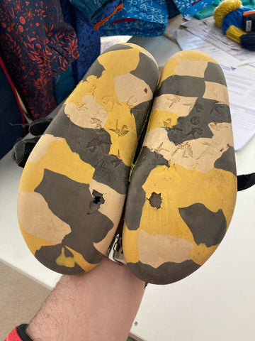 PaperKrane Jungle sneakers showing worn through soles