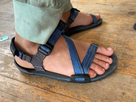 Child wearing Z-Trail Sandals by Xero Shoes
