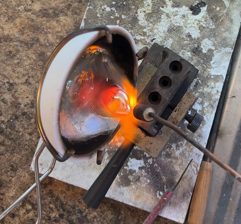 pouring silver into ingot mold