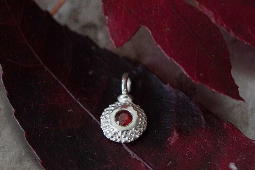 Catherine Hills Jewellery Garnet January birthstone pollen charm pendant