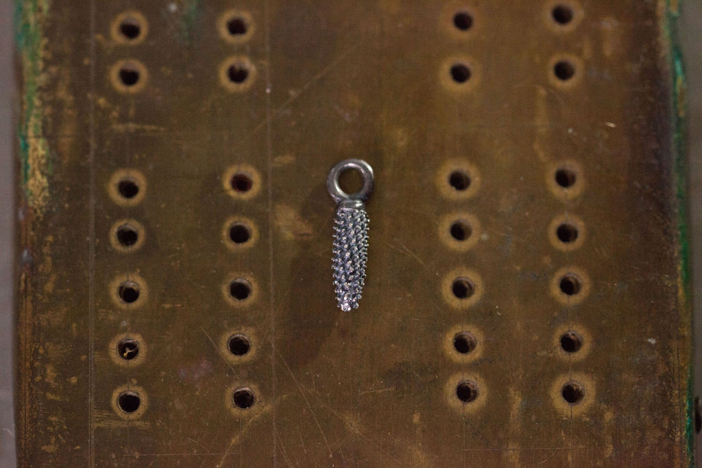 Catherine Hils Jewellery, spotted anther charm, oxidised silver