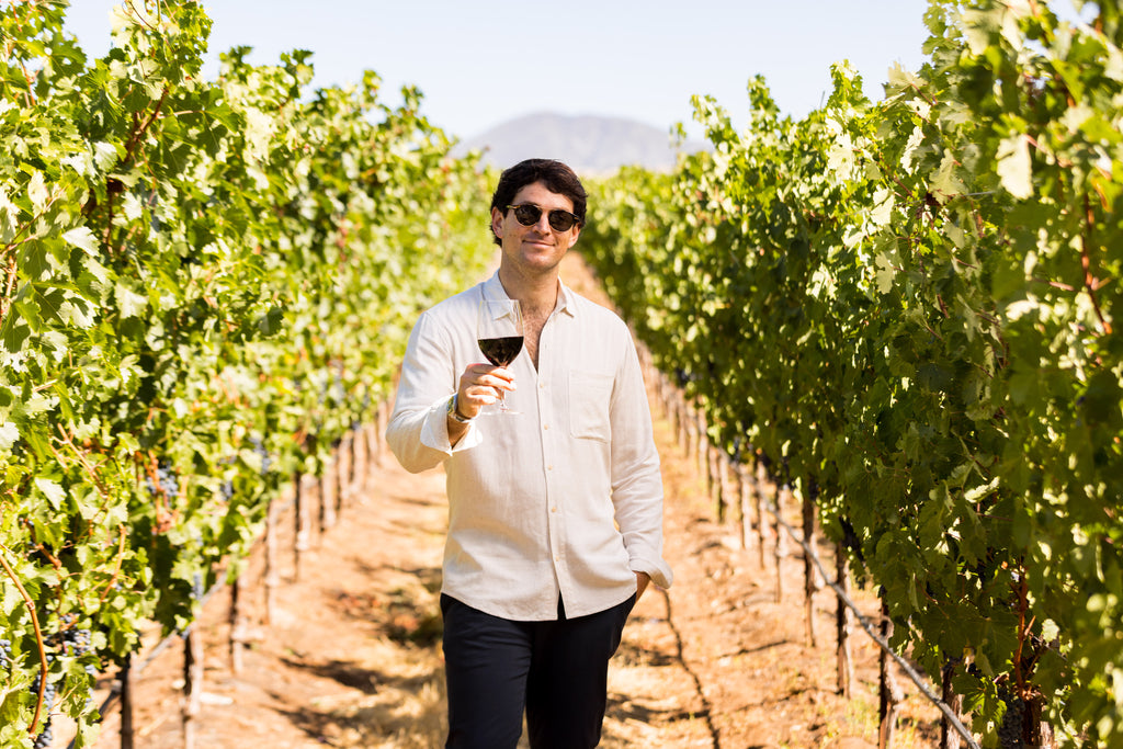 what to wear in napa as a guy to a winery. Long sleeve mens beige button up shirt.