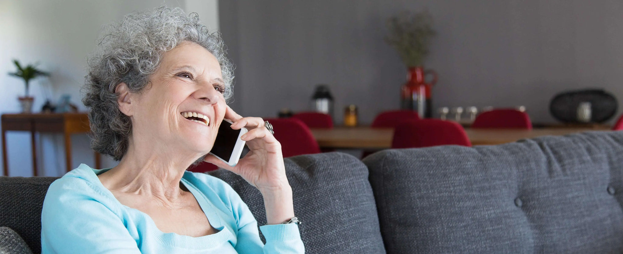 1739352873-1738749471-1727434406-portrait-happy-grandma-sitting-sofa-talking-phone-min__1___1___PID:e738cb1b-39e5-4070-b9bd-d671e59f828a