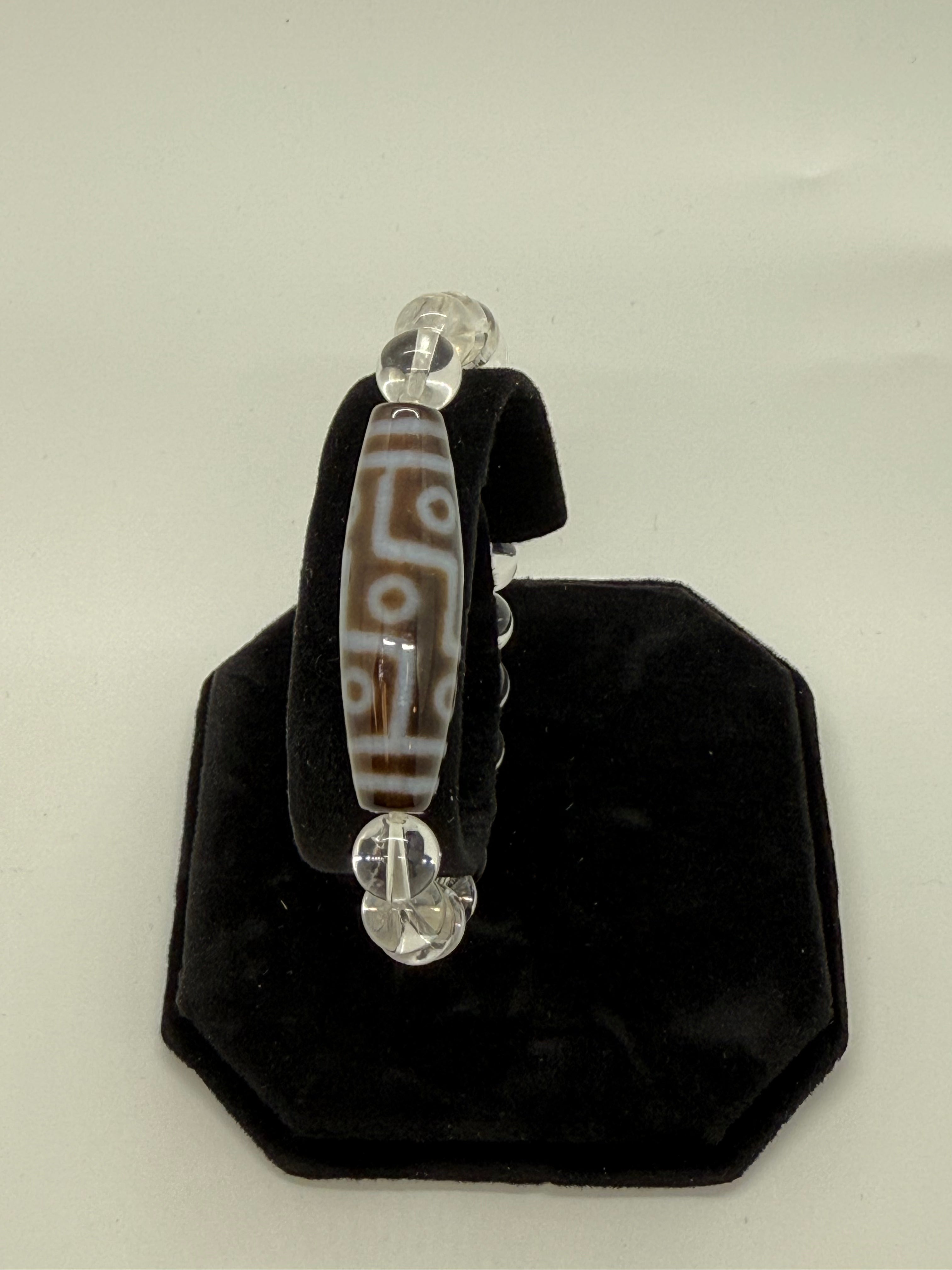 9225 - 9 Eye Dzi With 8mm Clear Crystal Beads Bracelet