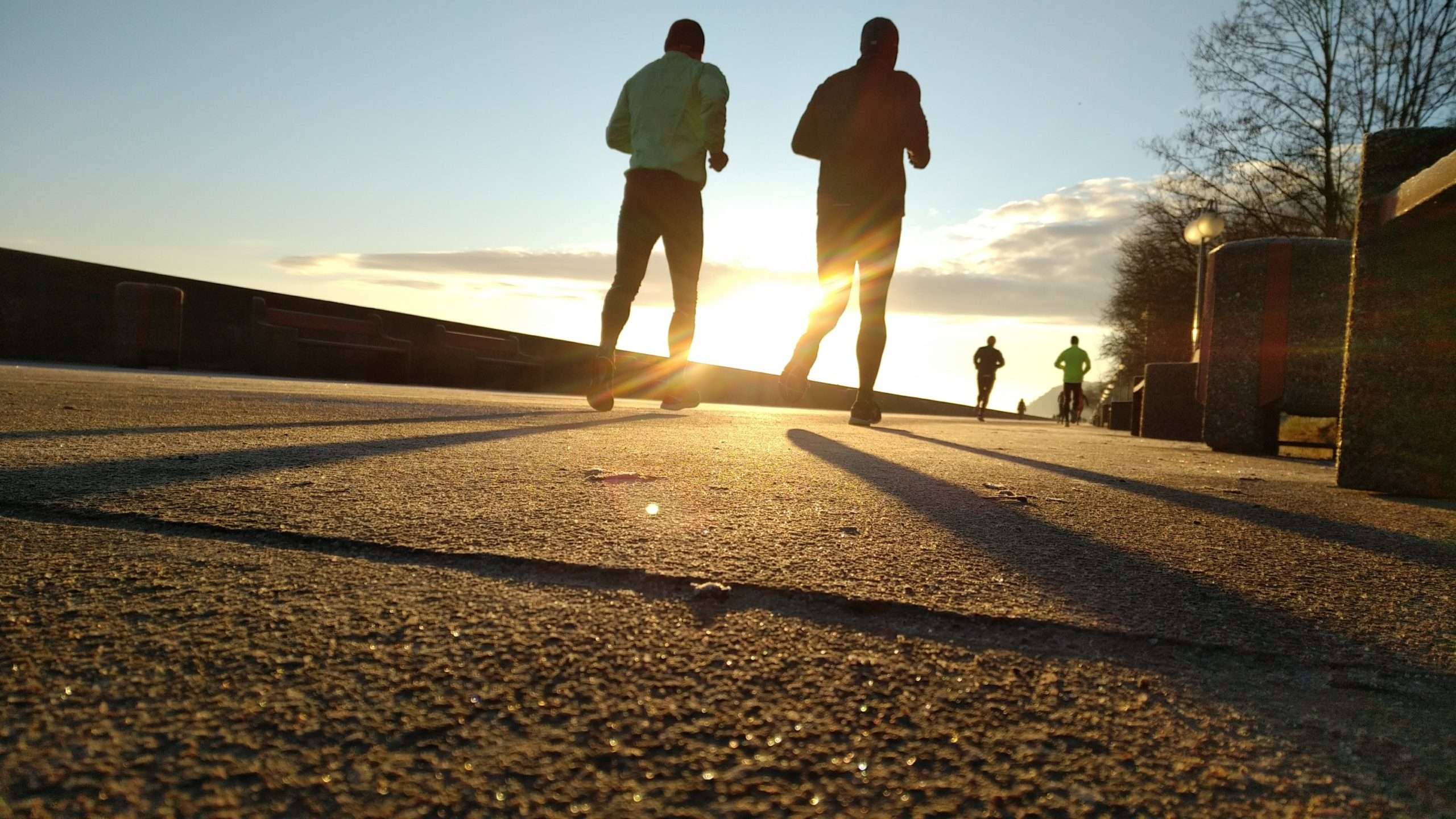 people running on a road