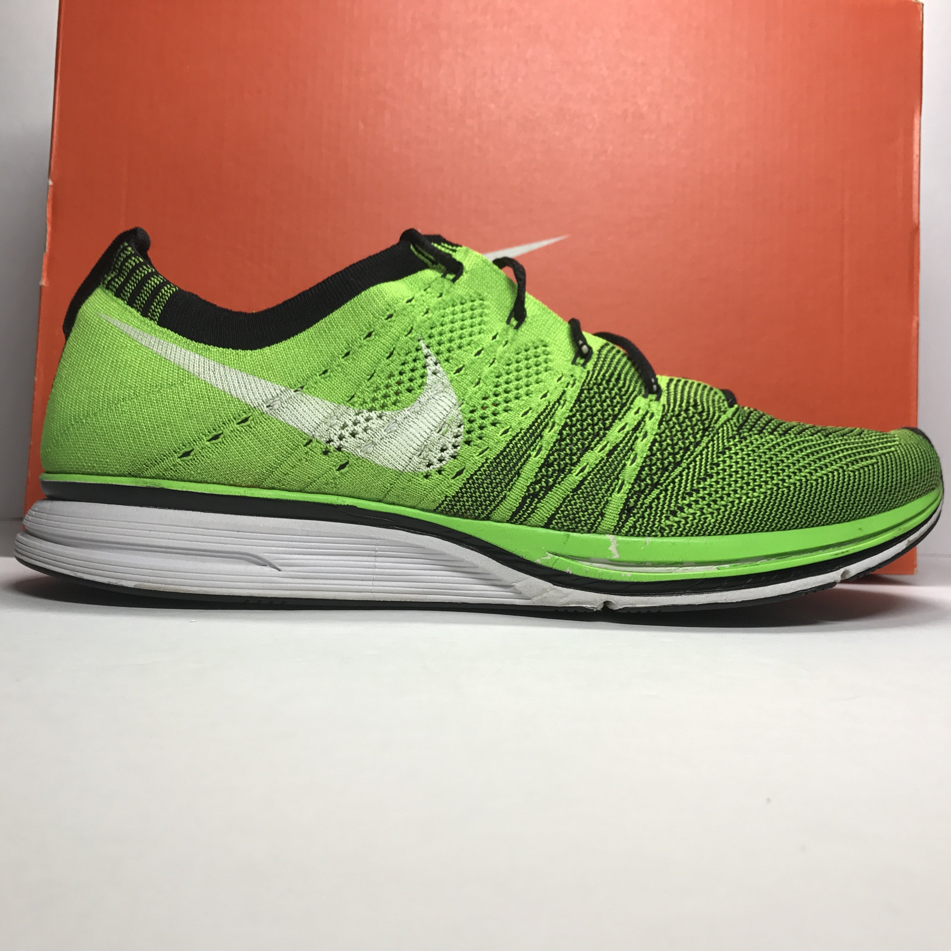 nike flyknit trainer electric green