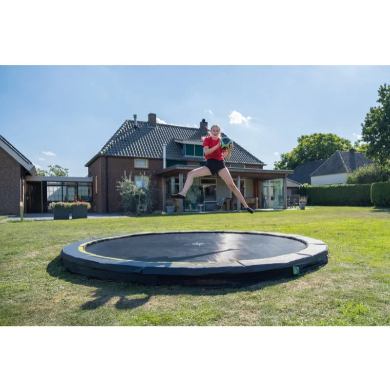EXIT_Silhouette_Ground_Sports_Trampoline_14ft_girl_jumping