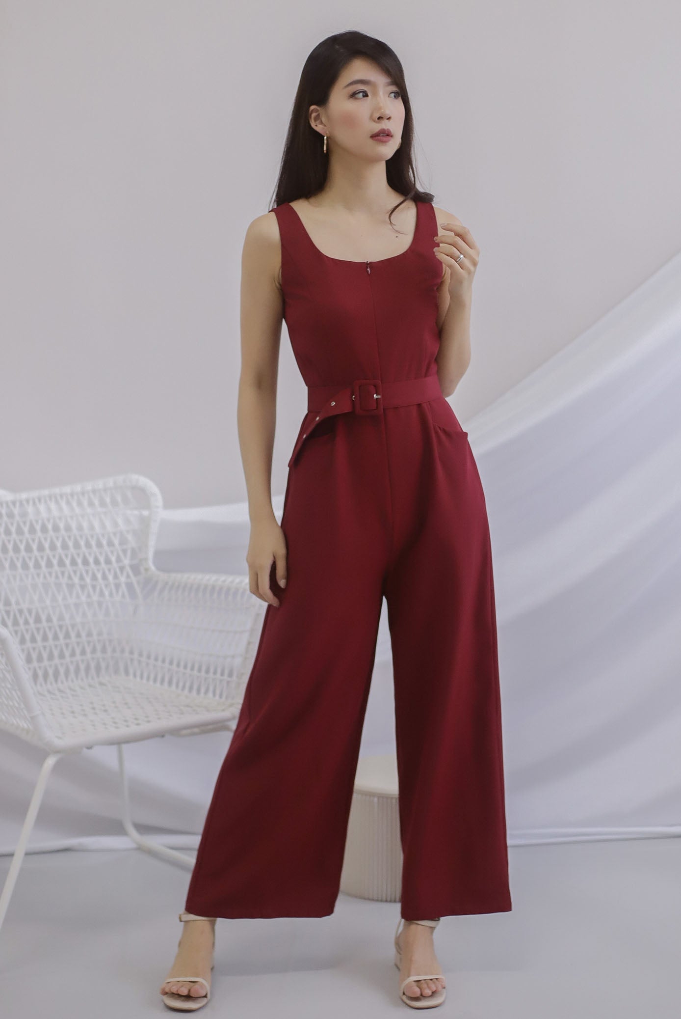 red belted jumpsuit