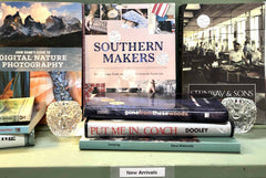 Books at Junebug Books and Collectibles' booth at Junk in the Trunk in Athens, Georgia