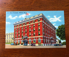 A vintage postcard that shows the Georgian Hotel in downtown Athens, Georgia