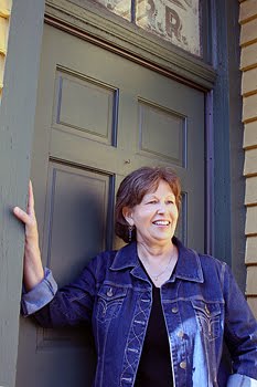 Author Donny Bailey Seagraves at the Winterville, Georgia historic train depot door. Photo credit: Lorin Sinn-Clark.