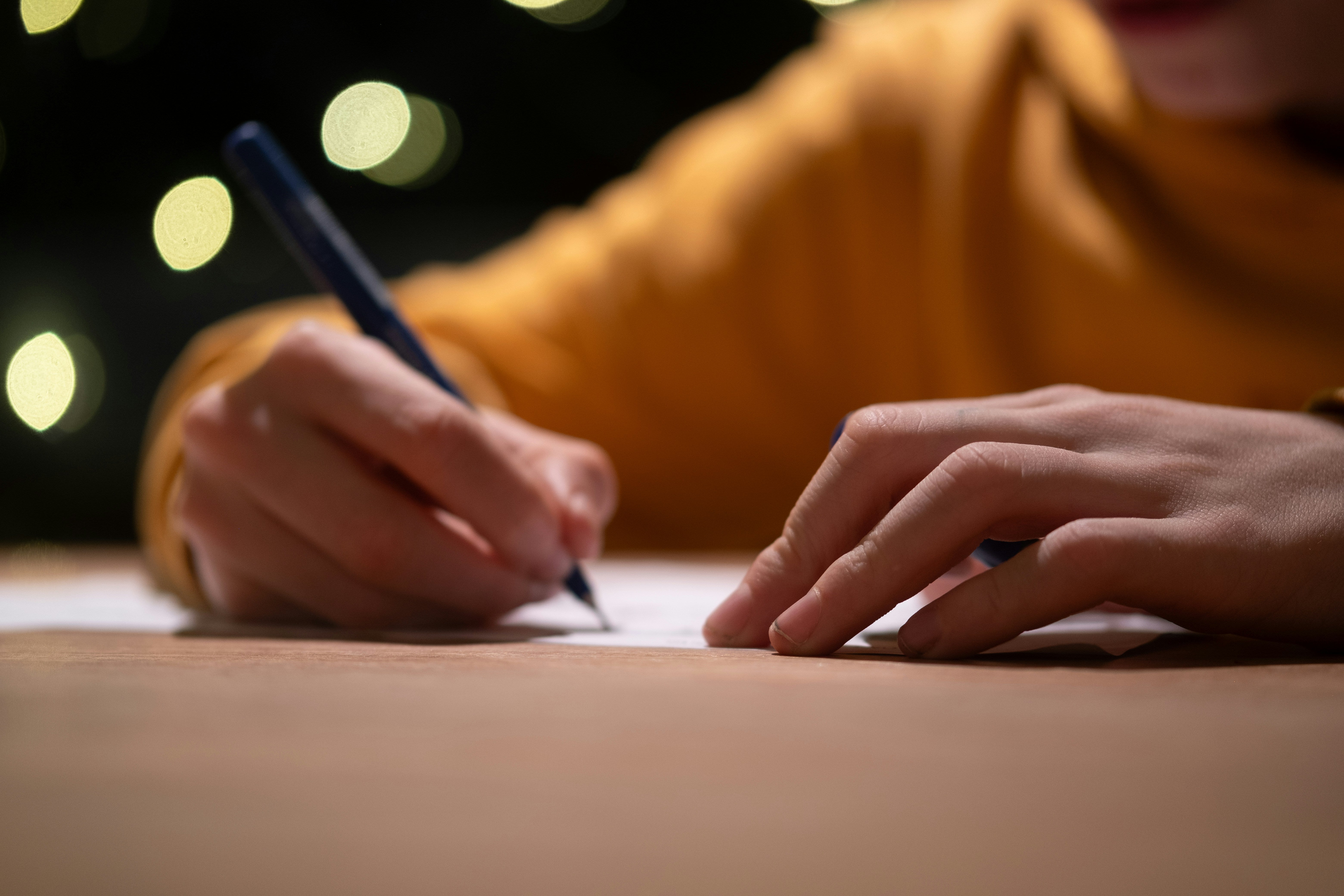 Man writing a note.