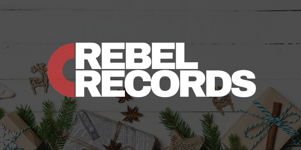 Rebel Records logo on a holiday themed background