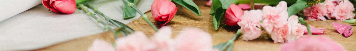 A vibrant bouquet of lilies, tulips, and daisies in a modern vase, the perfect Administrative Professionals' Day flower gift to show appreciation in Vancouver.