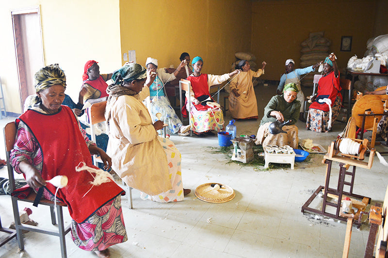 Women Spinning Cotton