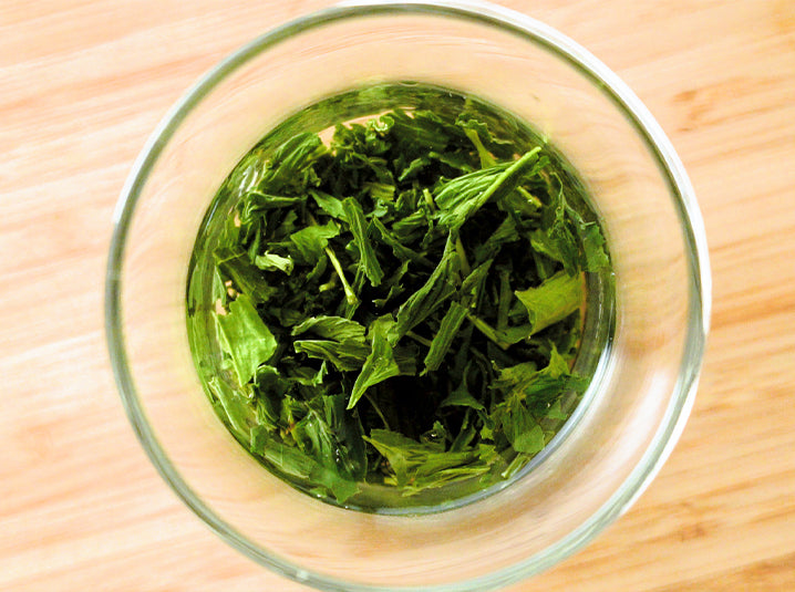 brewed gyokuro green tea in a glass cup