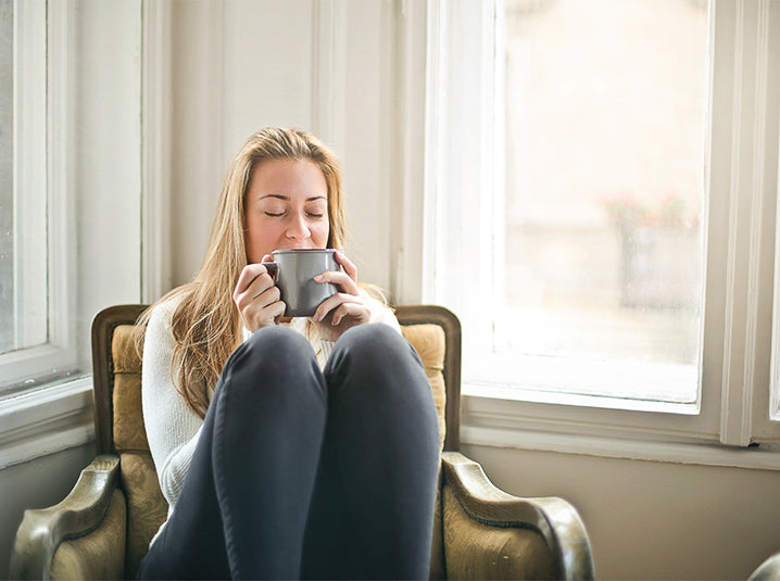 blonde girl drinking tea