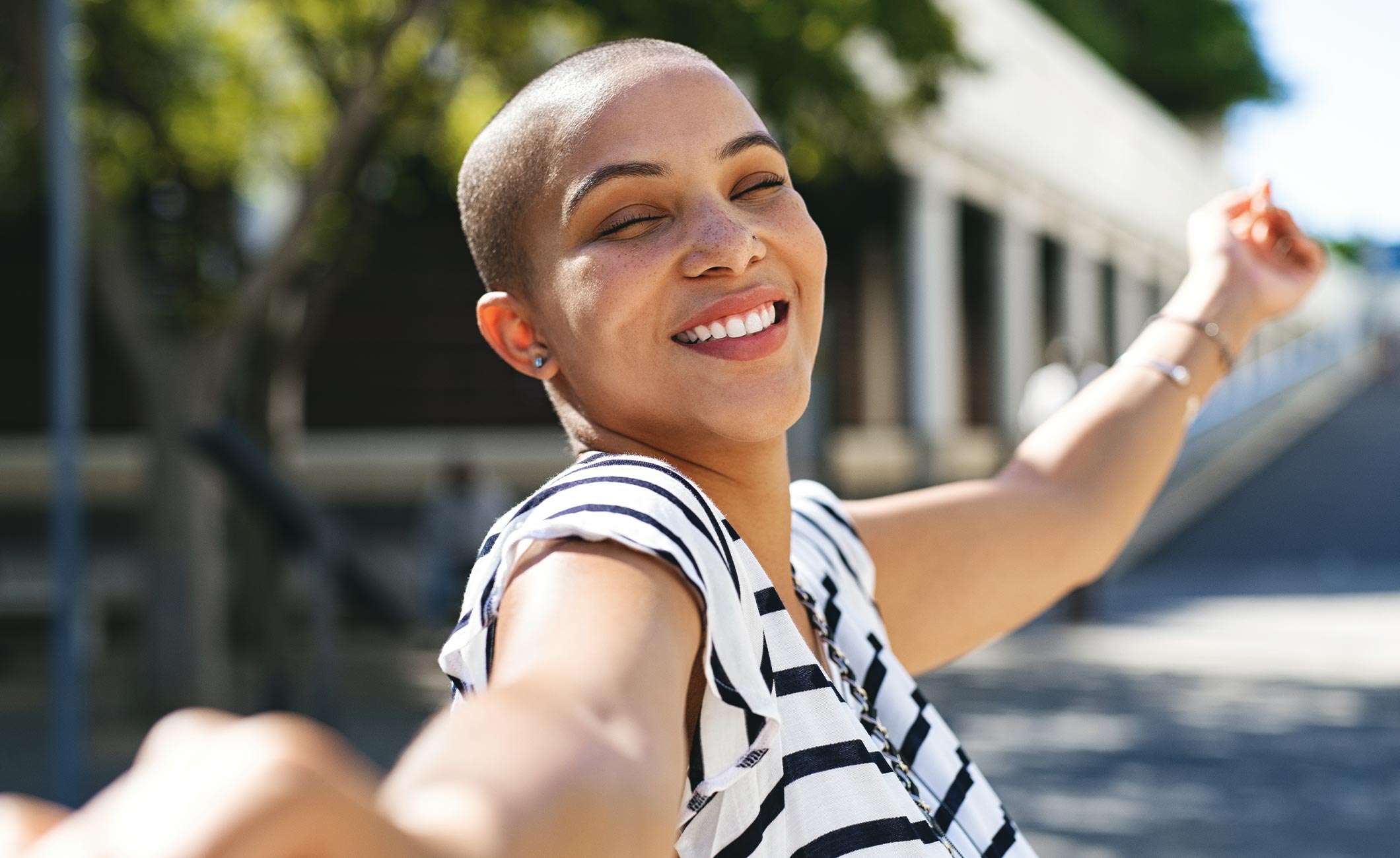 bald woman smiling 