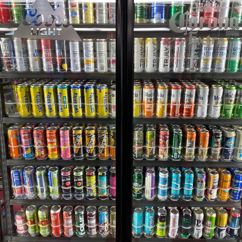 Variety of tallboy beer and seltzer cans