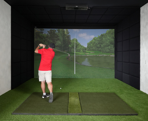 Carl's Place Built-In Golf Room Kit with golfer and Hitting Mat.