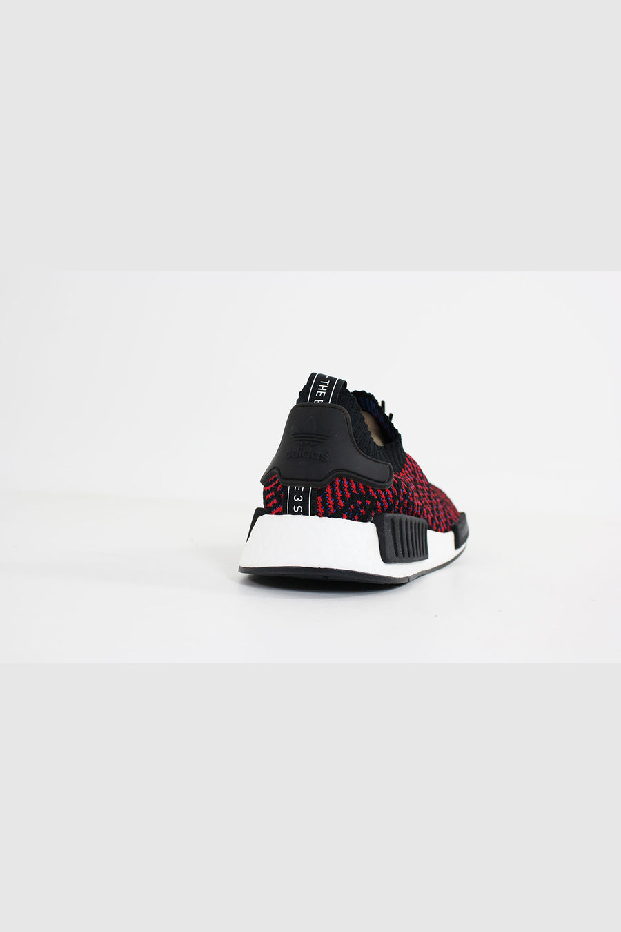 ødemark karakter Brise Adidas - NMD R1 STLT Primeknit (Core Black/ Red SLD/ Blue) CQ2385 –  Sneakerworld