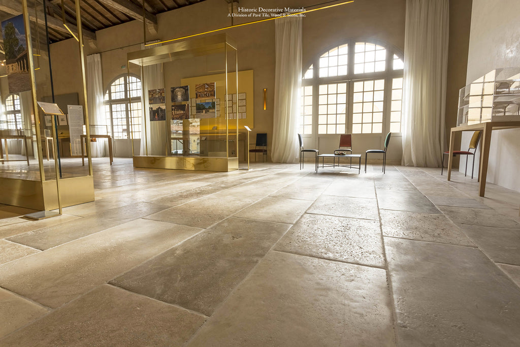 Antiqued or aged French limestone flooring resembles antique French limestone floors that marry with antique French oak floors for cottage interiors, farmhouse style, country French aesthetics that also use antique Belgian bluestone floors