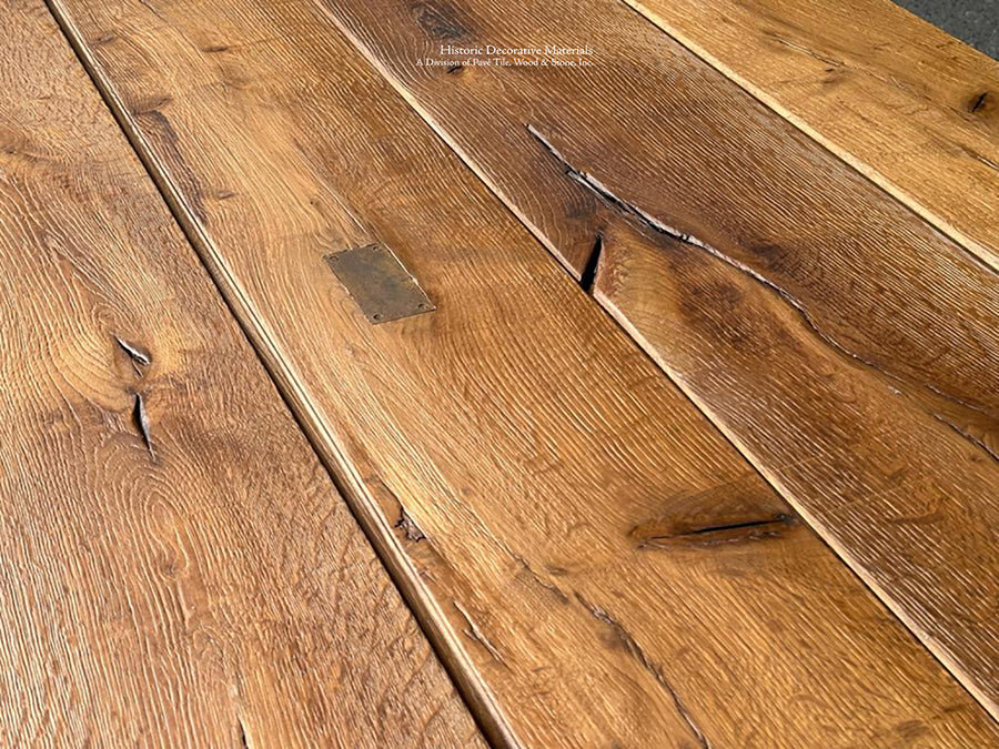 Antiqued French Oak Flooring or reclaimed French oak flooring marries with antique Belgian bluestone floors, reclaimed French terra cotta tiles, antique French limestone floors and Delft Tiles