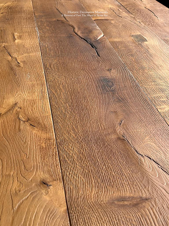 Antiqued French Oak Flooring or reclaimed French oak flooring marries with antique Belgian bluestone floors, reclaimed French terra cotta tiles, antique French limestone floors and Delft Tiles