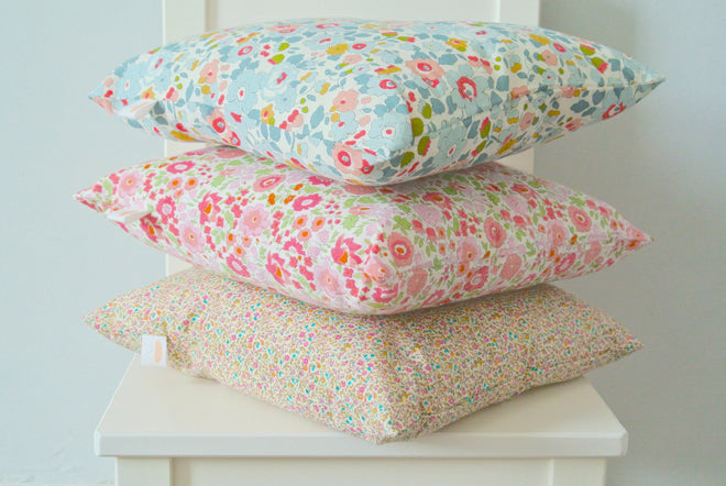 Children's cushions made from liberty print fabrics by Little Cloud, published by Bobby Rabbit