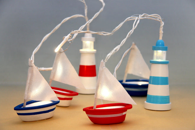 Nautical-themed boats and lighthouses garland lighting from Little Yellow Birds, published by Bobby Rabbit