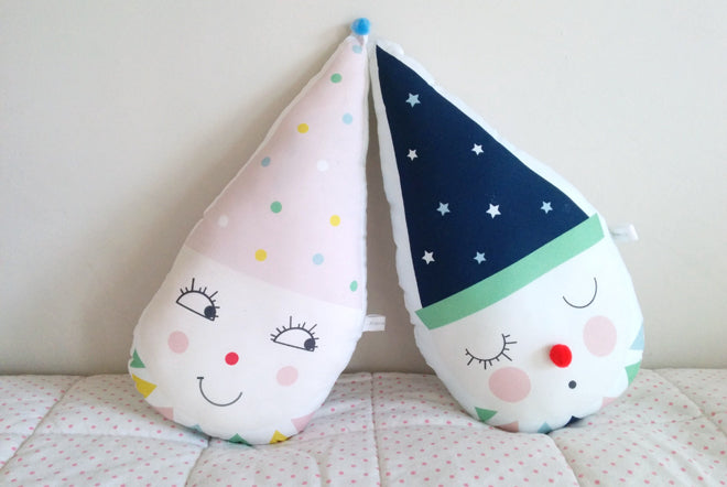 Clown cushions in pink and blue by Pompon Petillant, available at Petit Home, published by Bobby Rabbit