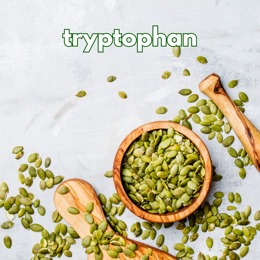 Wooden bowl and spoons with pumpkin seeds, 'tryptophan' text above.