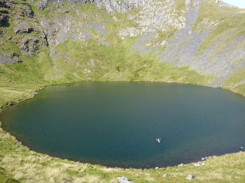wild swimming photo Scales Tarn Lake District during Mind Over Mountains walking for wellness retreat