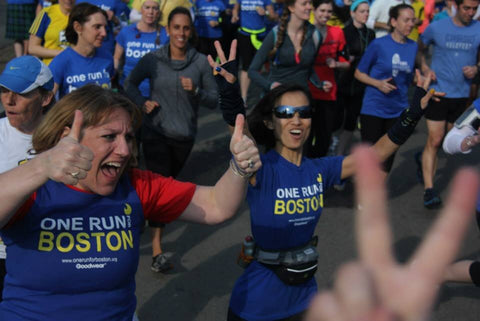 women running wearing Boston t shirts