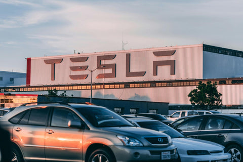 Cars Parked in Front of Tesla Company