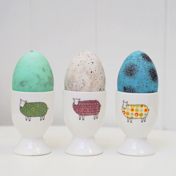 Colourful Sheep Egg Cups by Mary Kilvert with Glass Easter Egg Decorations