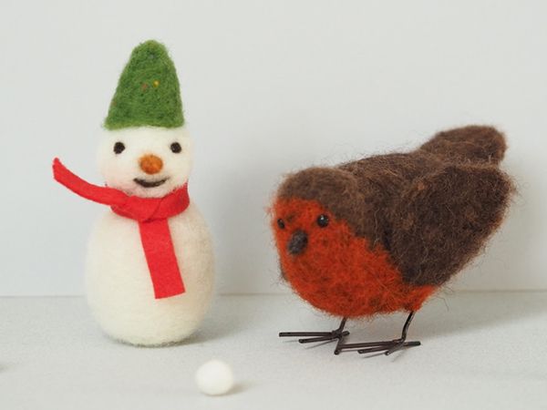 A felted snowman and robin by Mary Kilvert